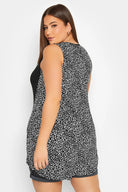 Büyük Beden Cep Detaylı Sırtı Leopar Desenli Sıfır Kol Bisiklet Yaka Bluz 302257