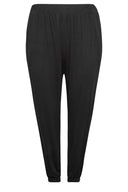 Büyük Beden Paçası ve Beli Lastikli Cepli İnce Pantolon 143299