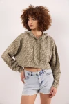 Oversize Uzun Kolları Lastikli Kapüşonlu Desenli Crop Kesim Sweatshirt